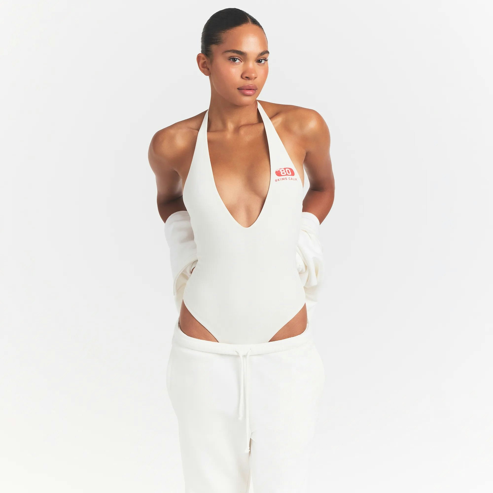 DEEP PLUNGE HALTER BODYSUIT